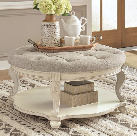 Realyn Signature Design by Ashley Ottoman Cocktail Table image